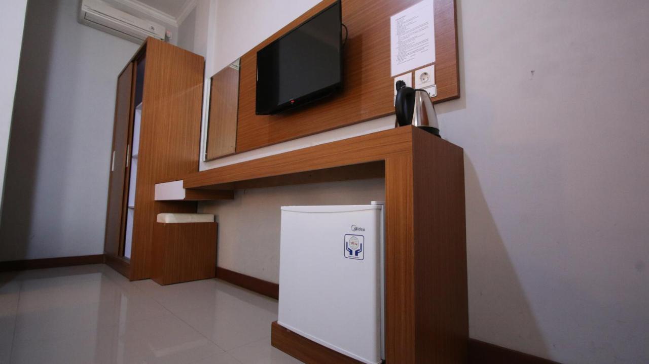 Tom Guest House Legian  Ngoại thất bức ảnh